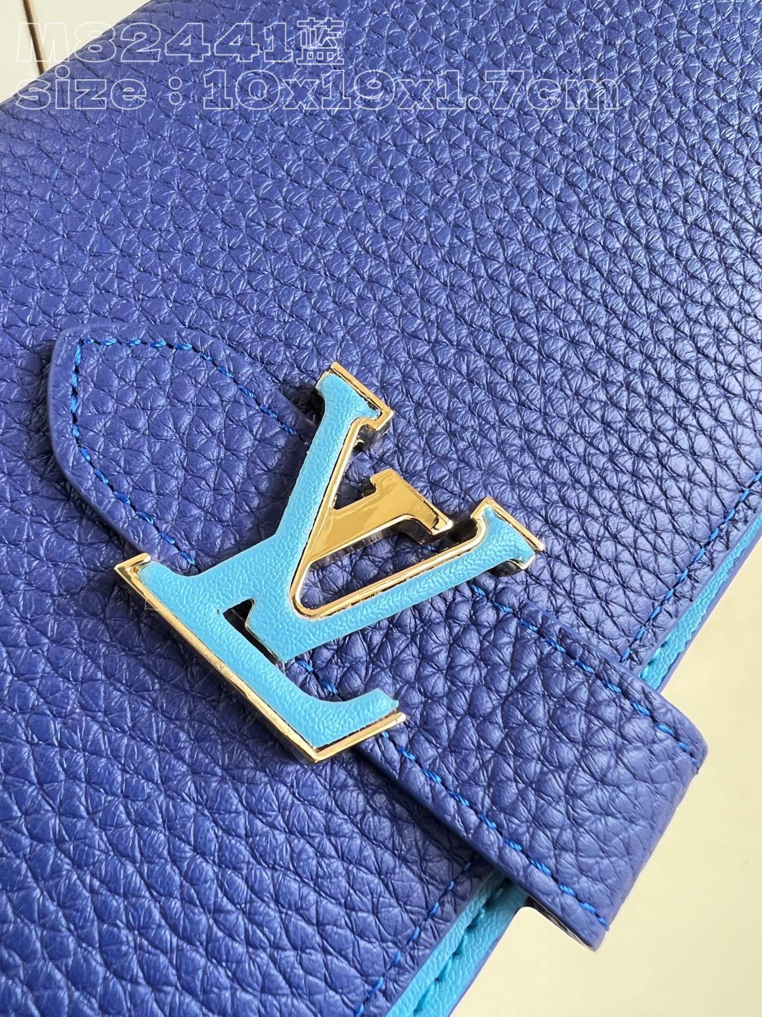 l0*is v*t0n m82441 blue lv vertical wallet in S*pple grained taurillon leather