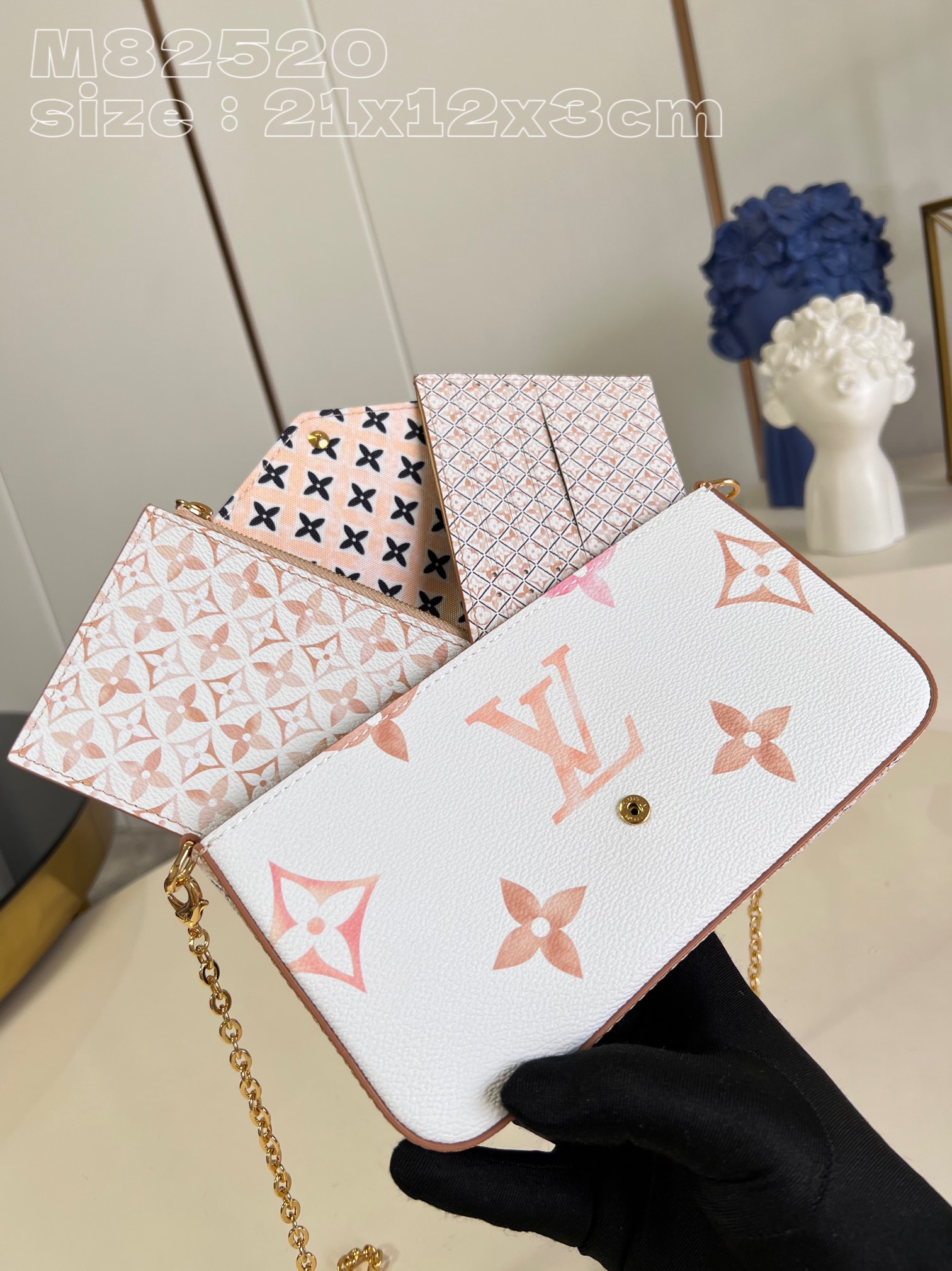 from the current holiday collection, the l0*is V*t0n m82520 pochette félicie chain bag
