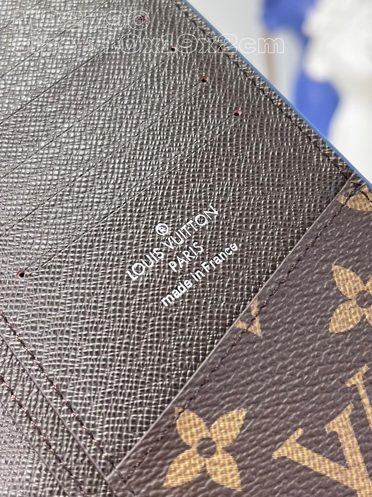 l0*is V*t0n m82790 blue brazza wallet in monogram-coated canvas with a color-blocked interior