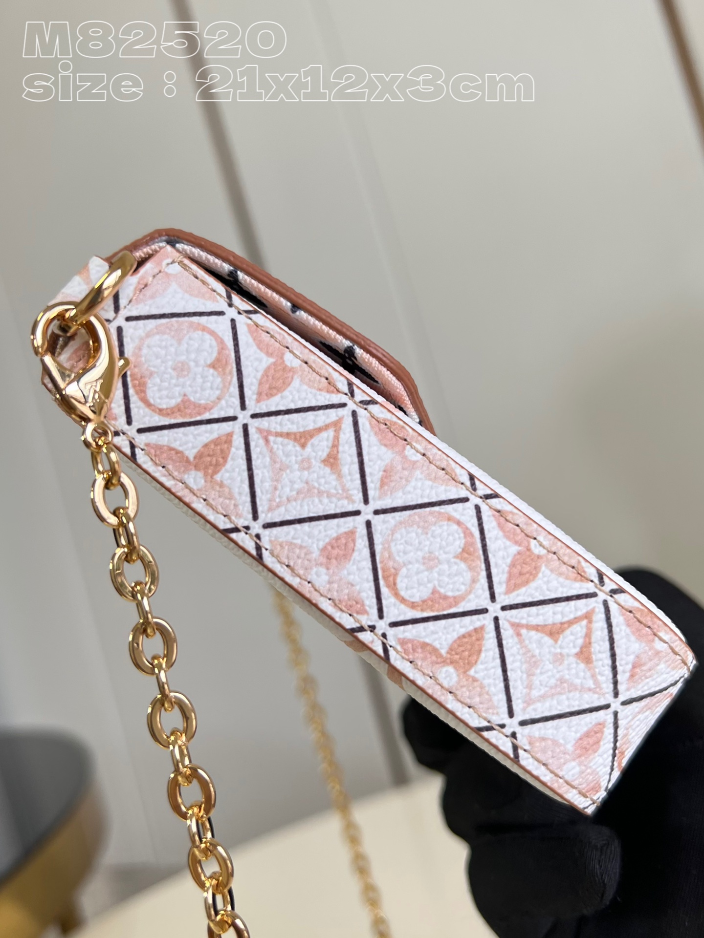from the current holiday collection, the l0*is V*t0n m82520 pochette félicie chain bag