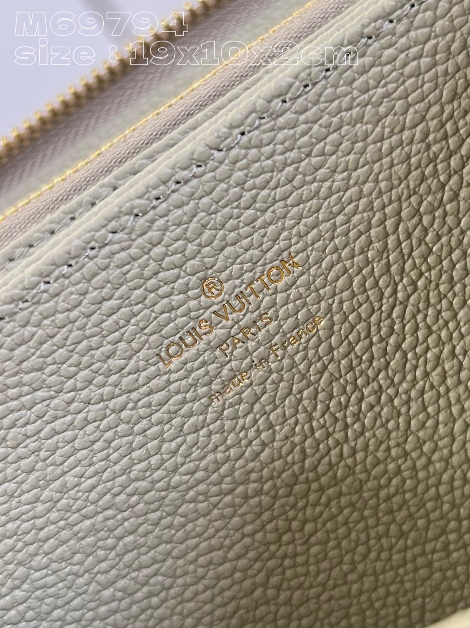 l0*is V*t0n m69794 zippy bag in green is made of colorful monogram empreinte leather