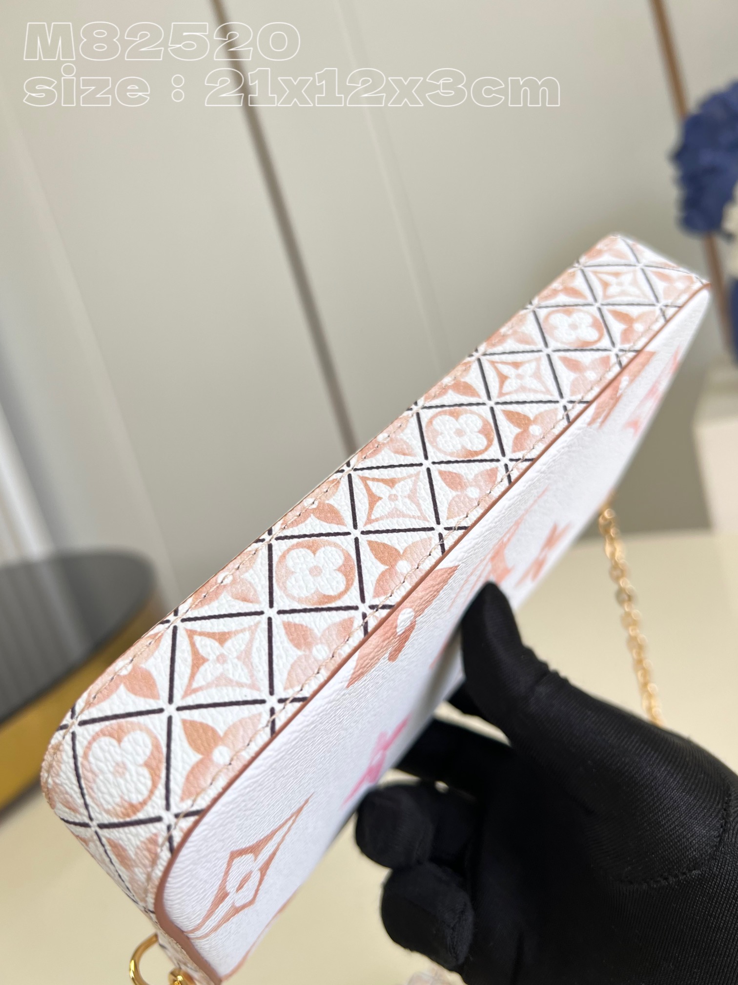 from the current holiday collection, the l0*is V*t0n m82520 pochette félicie chain bag