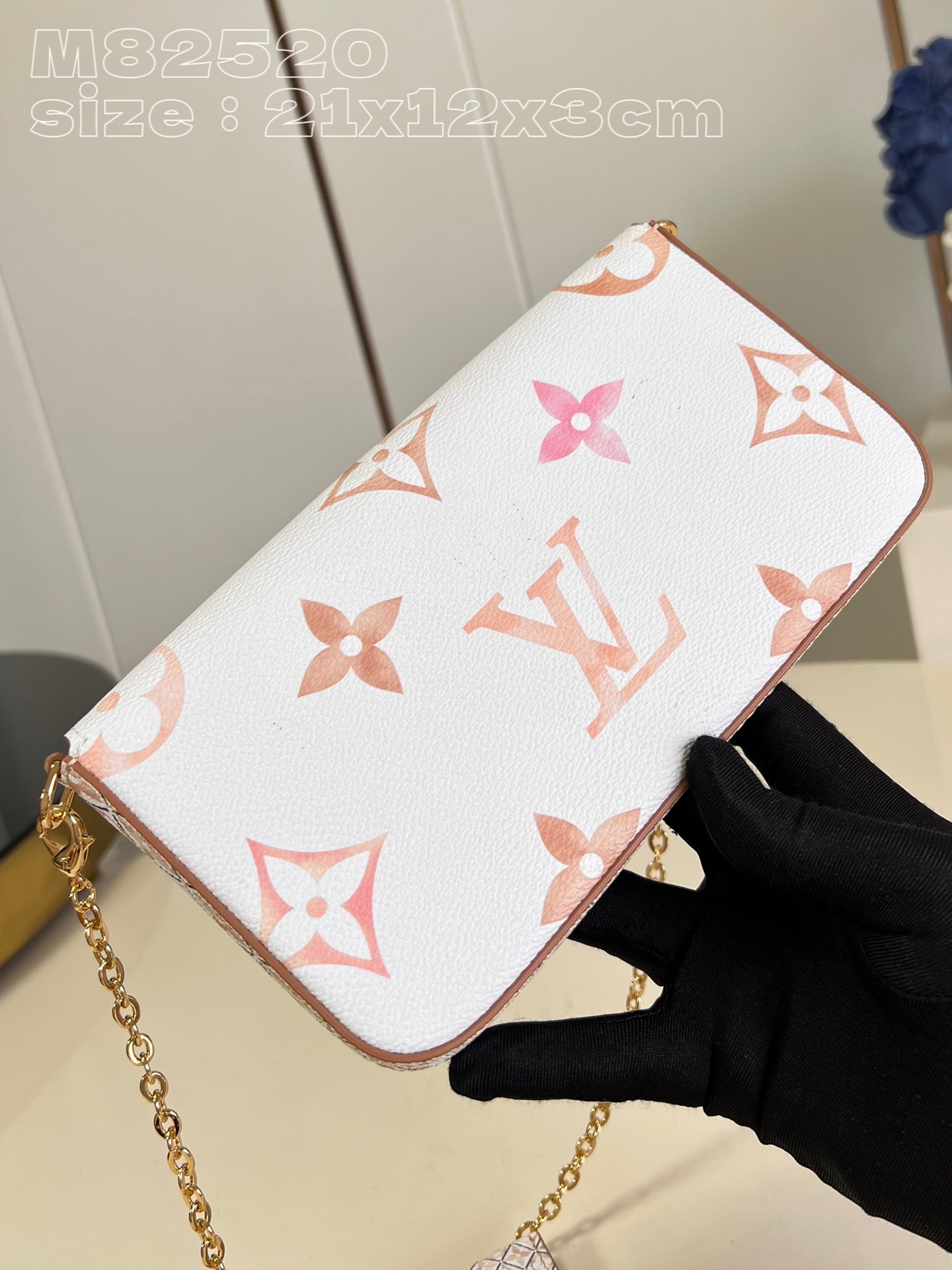 from the current holiday collection, the l0*is V*t0n m82520 pochette félicie chain bag