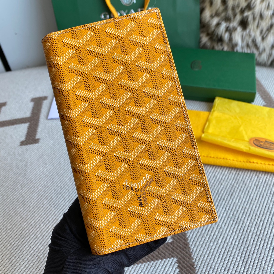 yellow Go*ard saint-lambert wallet is a universal phone case with all the everyday essentials in one
