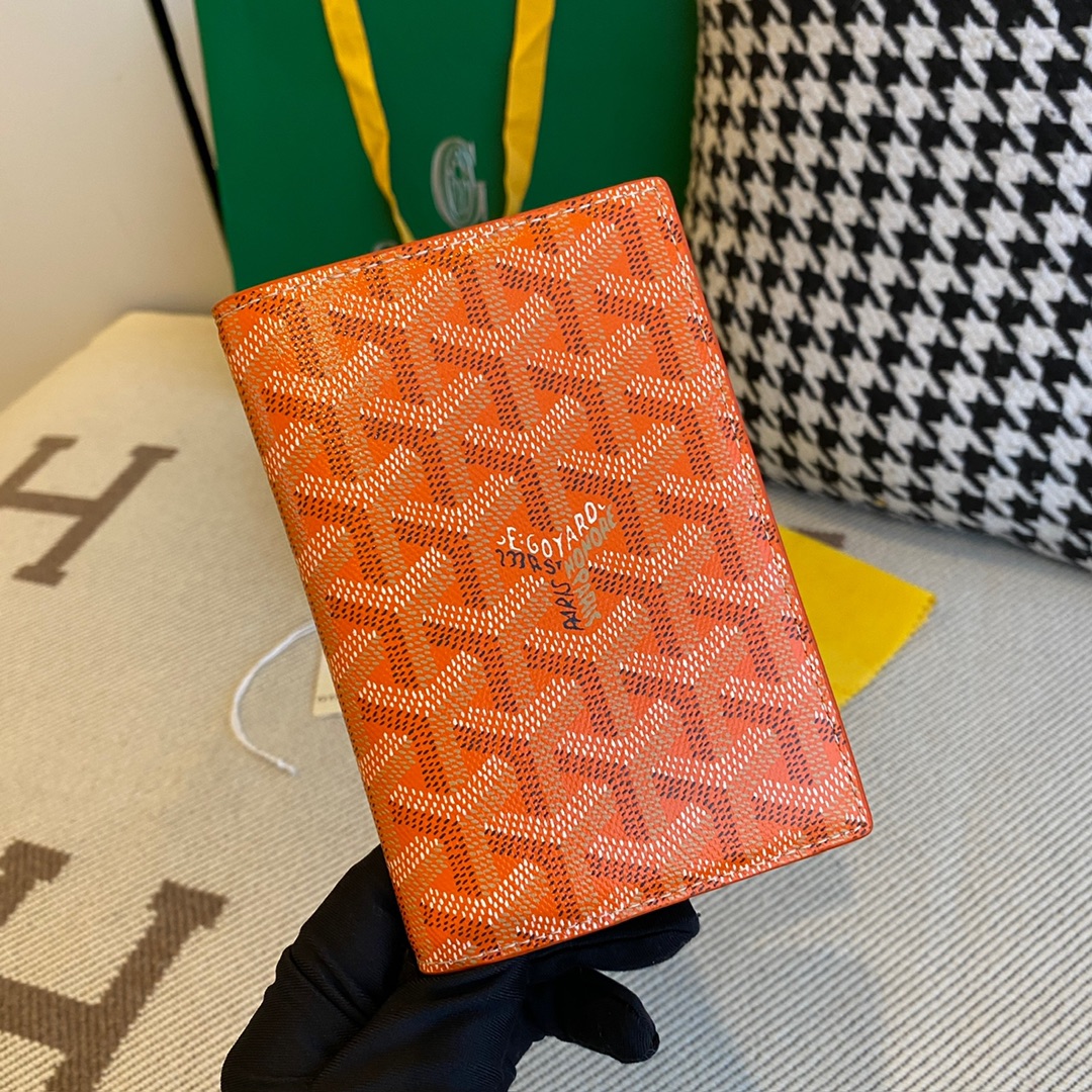 orange Go*ard grenelle passport cover is ideal for travelling