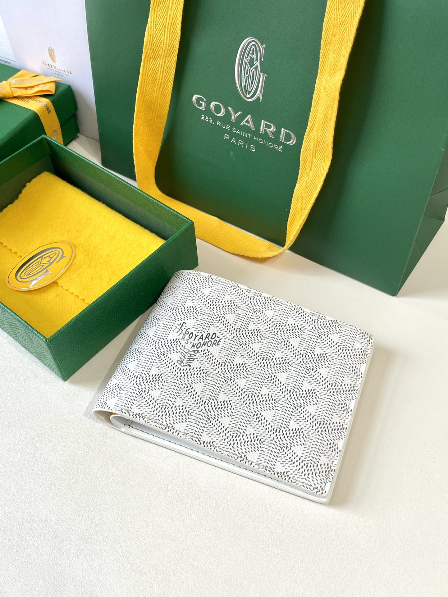 white Go*ard victoire wallet organising cards, papers and notes ,can be used in a bag