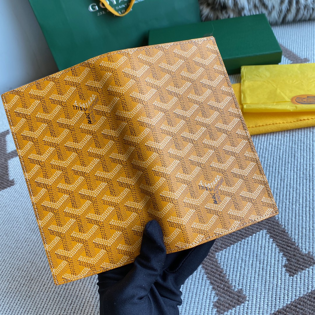 yellow Go*ard saint-lambert wallet is a universal phone case with all the everyday essentials in one