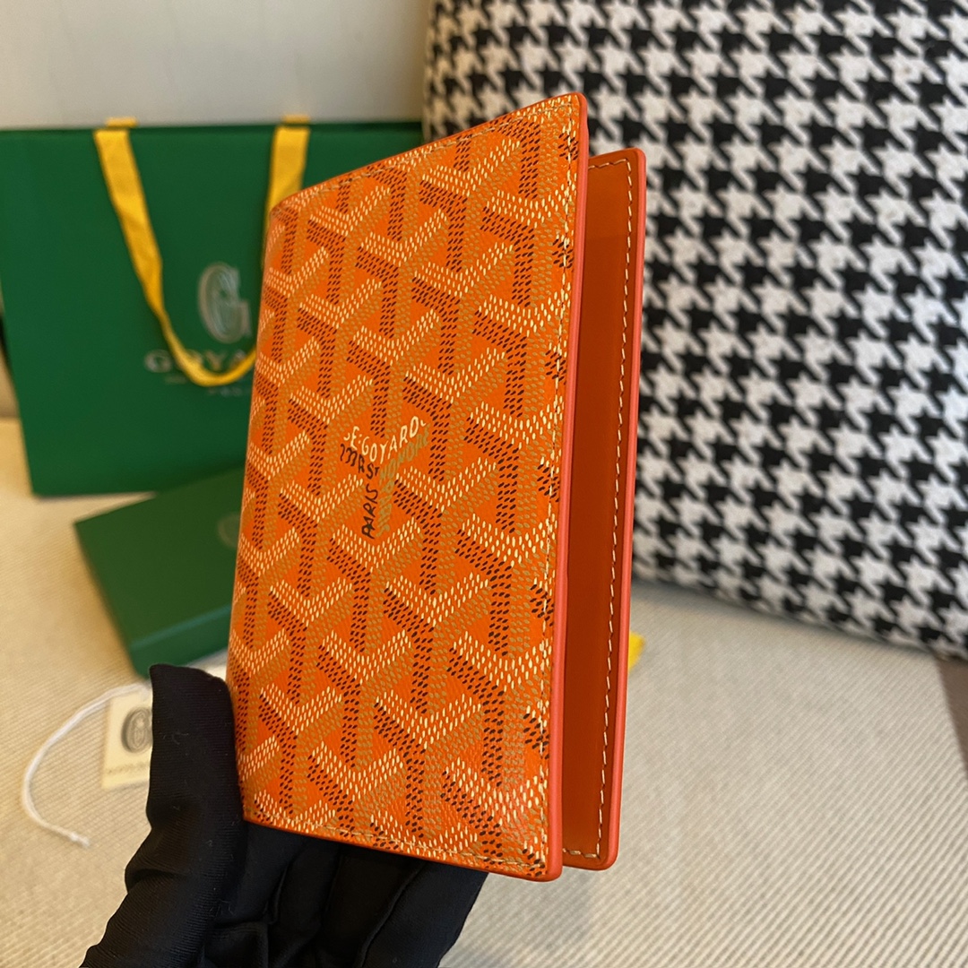 orange Go*ard grenelle passport cover is ideal for travelling
