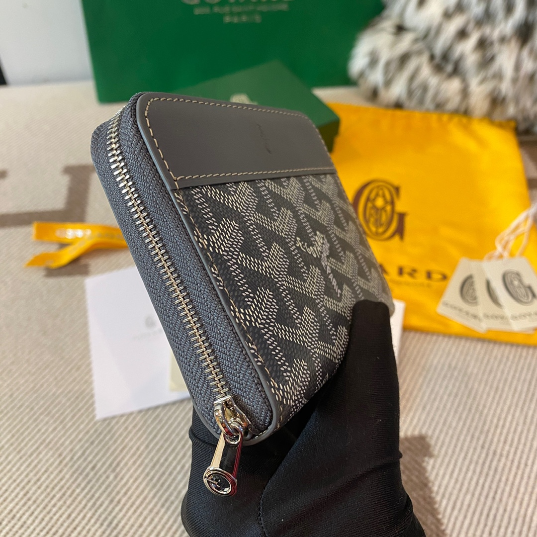 grey Go*ard matignon pm wallet is a compact shape and closes securely with a zip