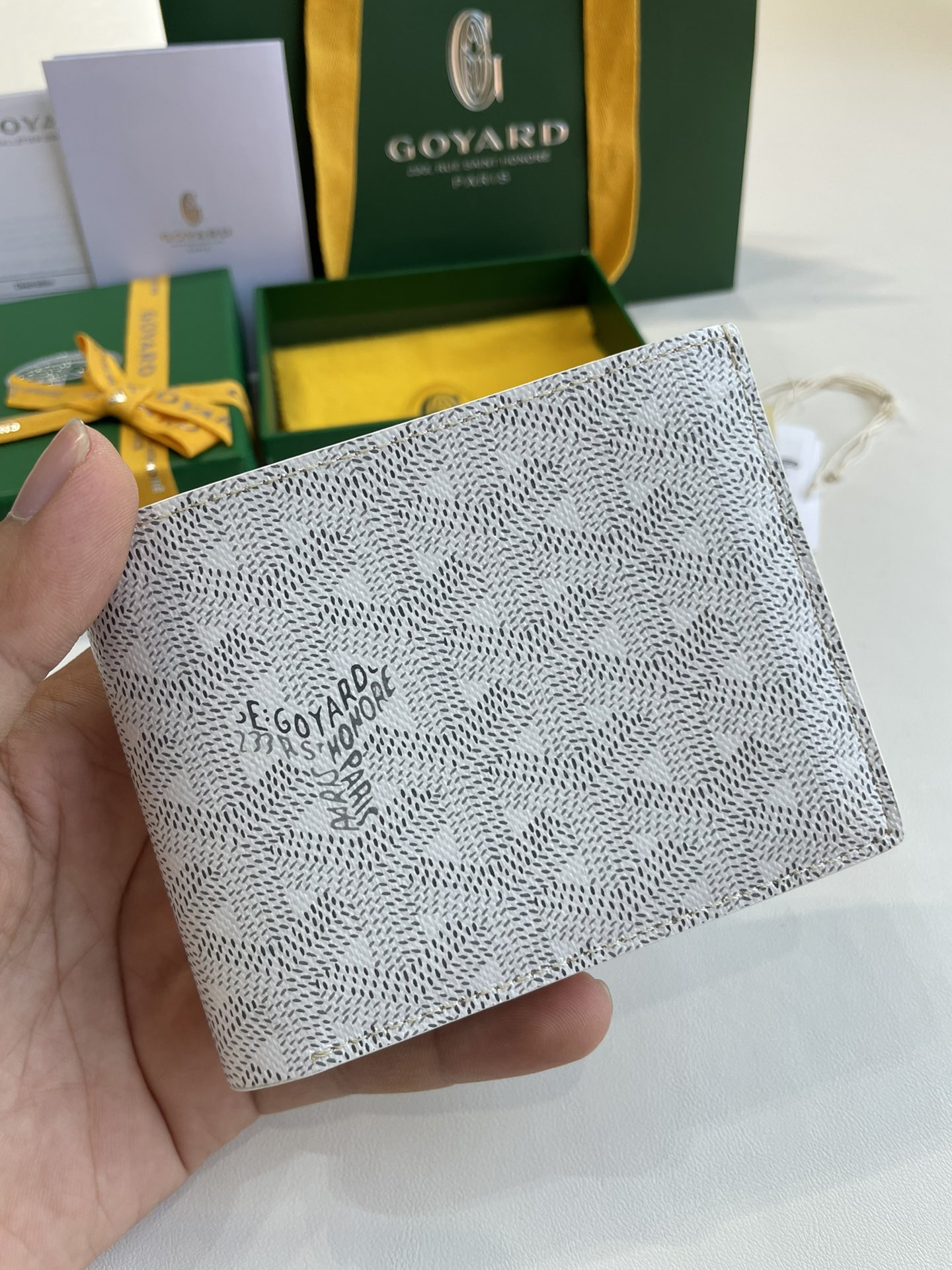 white Go*ard victoire wallet organising cards, papers and notes ,can be used in a bag