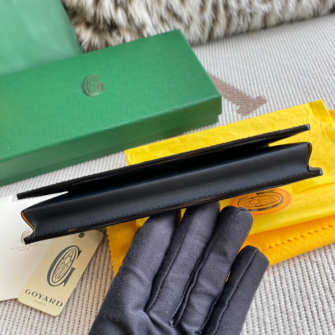 black Go*ard saint-lambert wallet is a universal phone case with all the everyday essentials in one