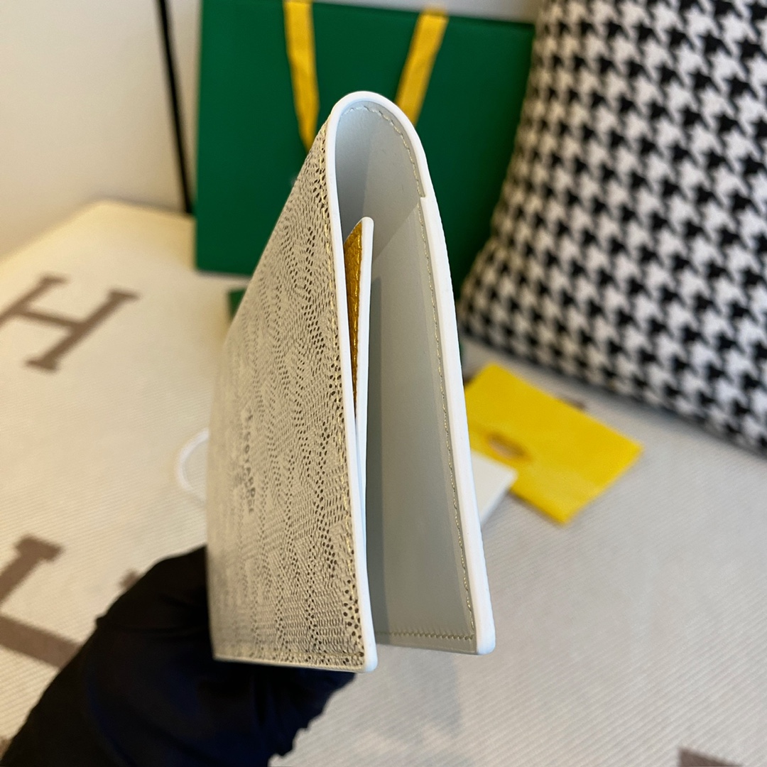 white Go*ard grenelle passport cover is ideal for travelling
