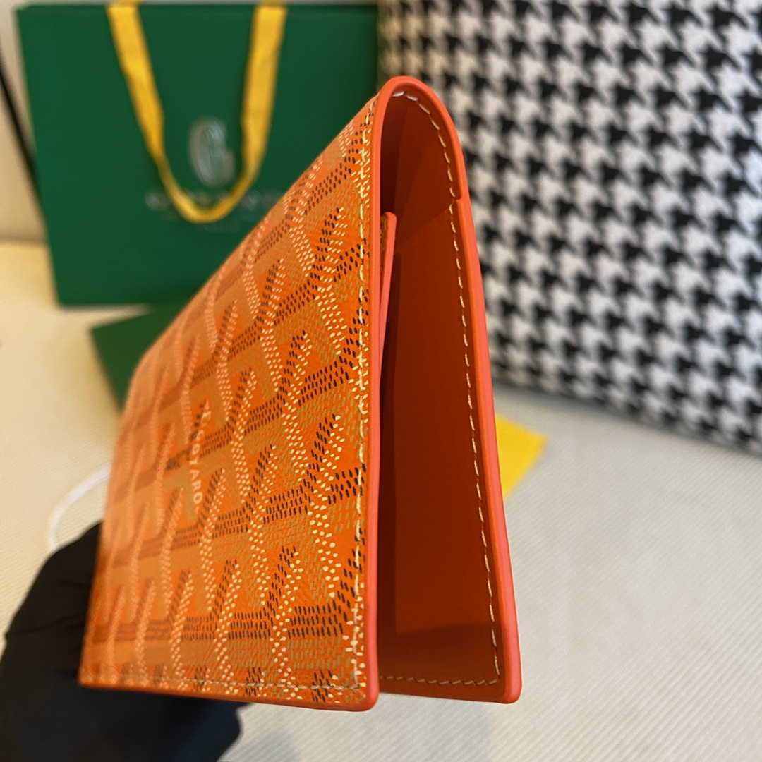 orange Go*ard grenelle passport cover is ideal for travelling