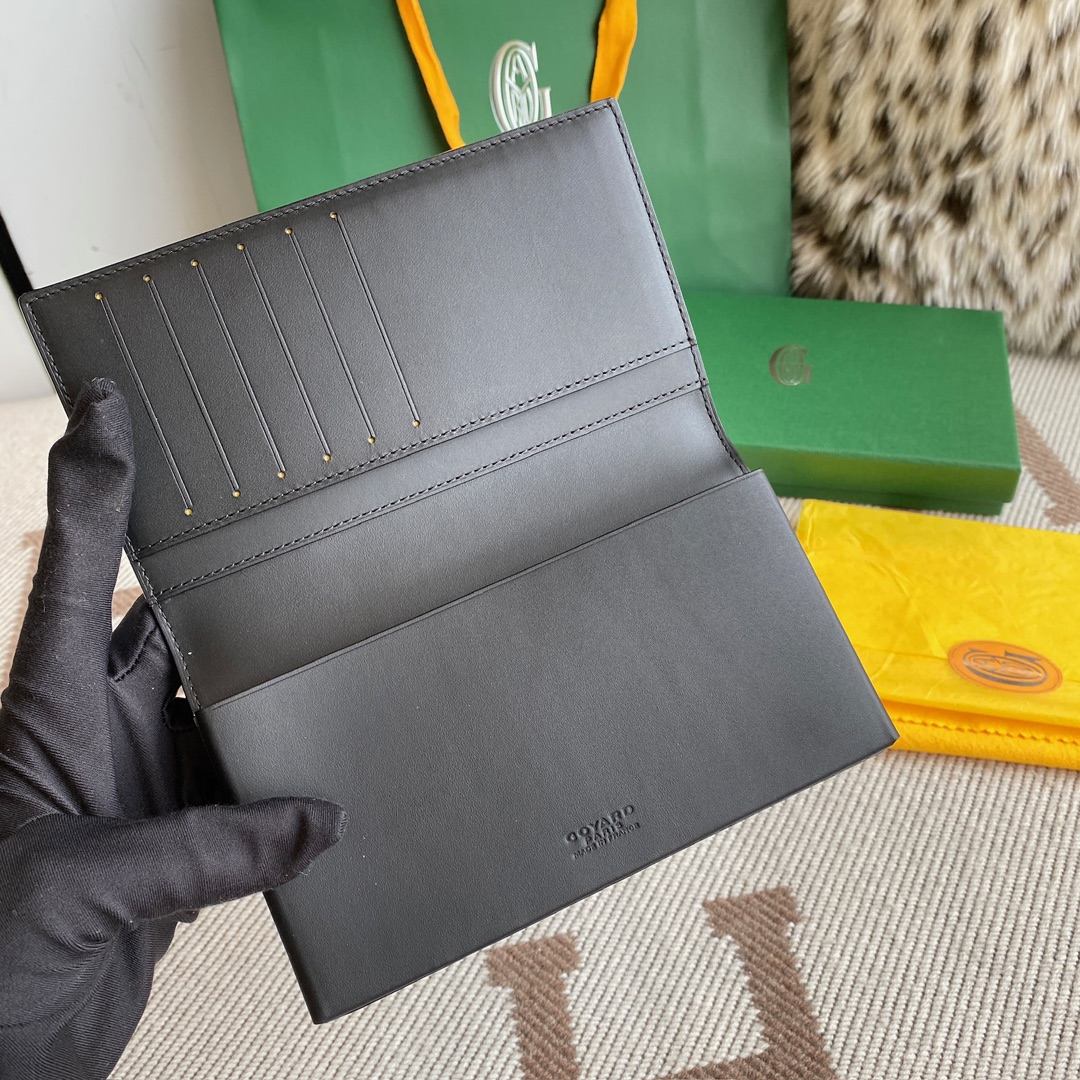 black Go*ard saint-lambert wallet is a universal phone case with all the everyday essentials in one