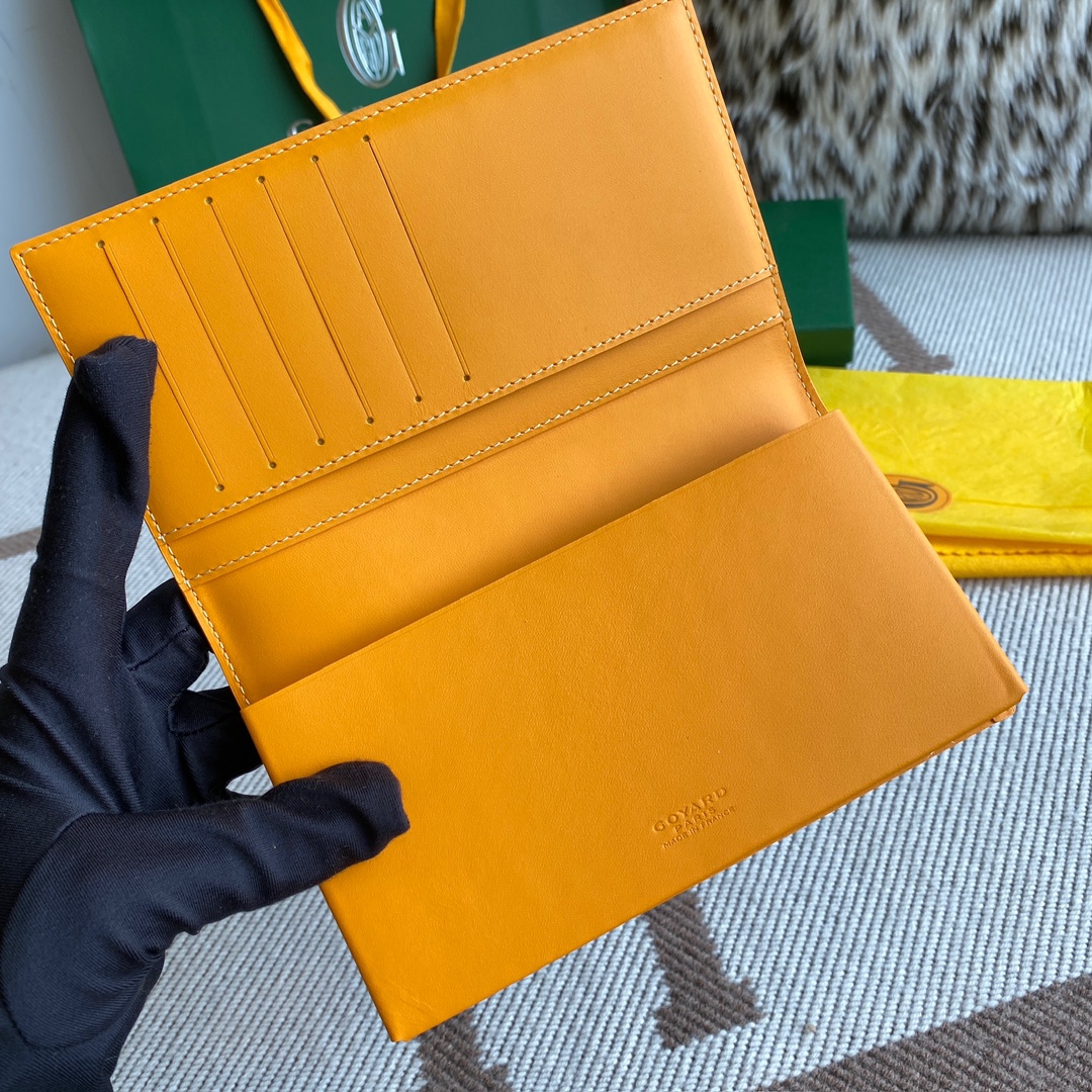 yellow Go*ard saint-lambert wallet is a universal phone case with all the everyday essentials in one