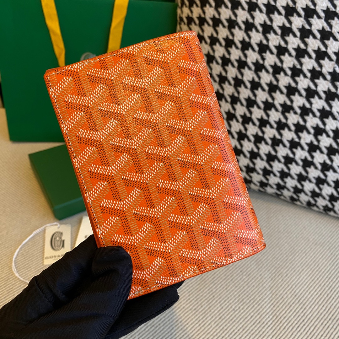 orange Go*ard grenelle passport cover is ideal for travelling