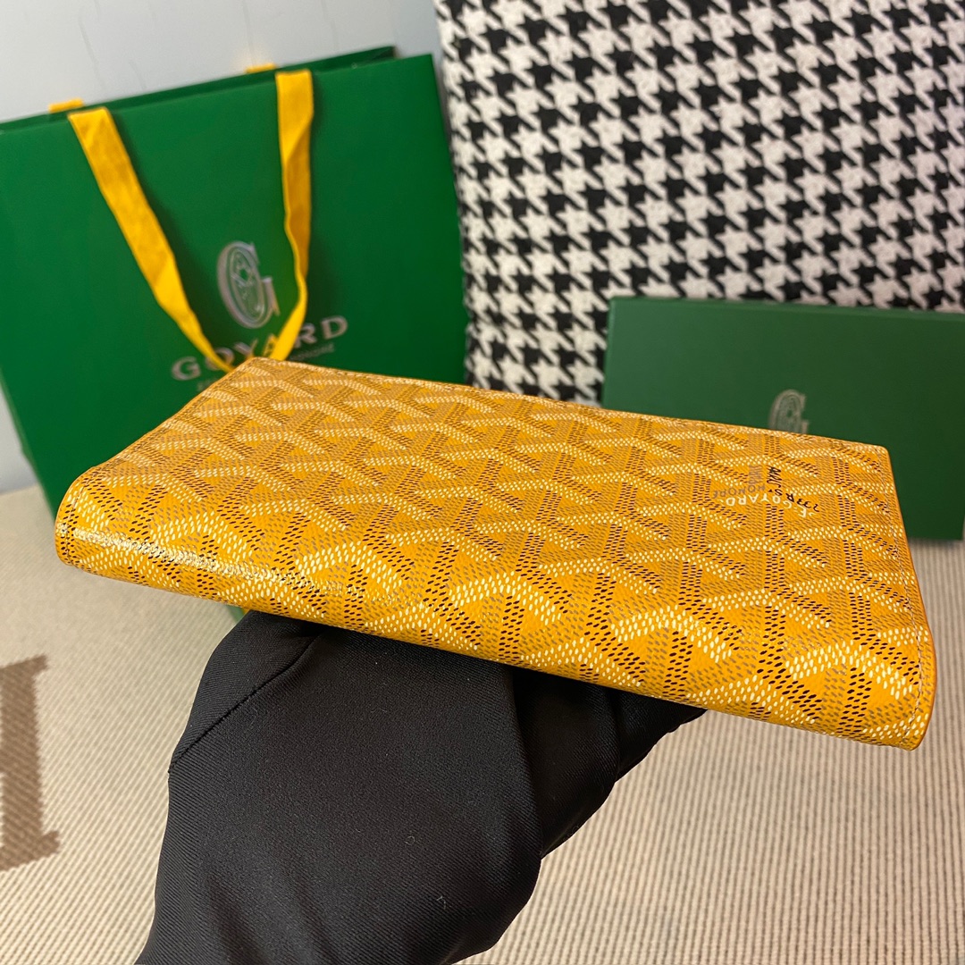 yellow Go*ard richelieu wallet a long wallet that fastens with a snap fastener