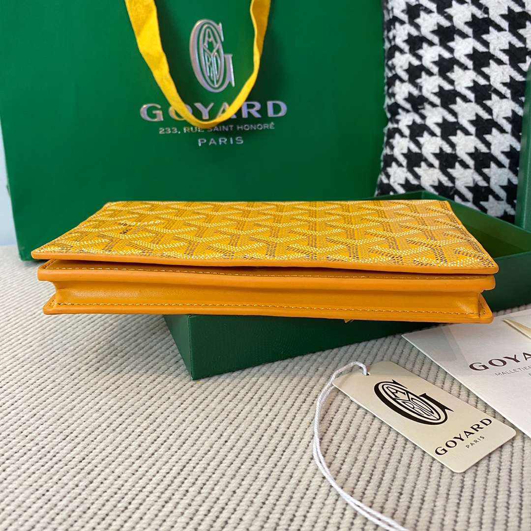 yellow Go*ard richelieu wallet a long wallet that fastens with a snap fastener