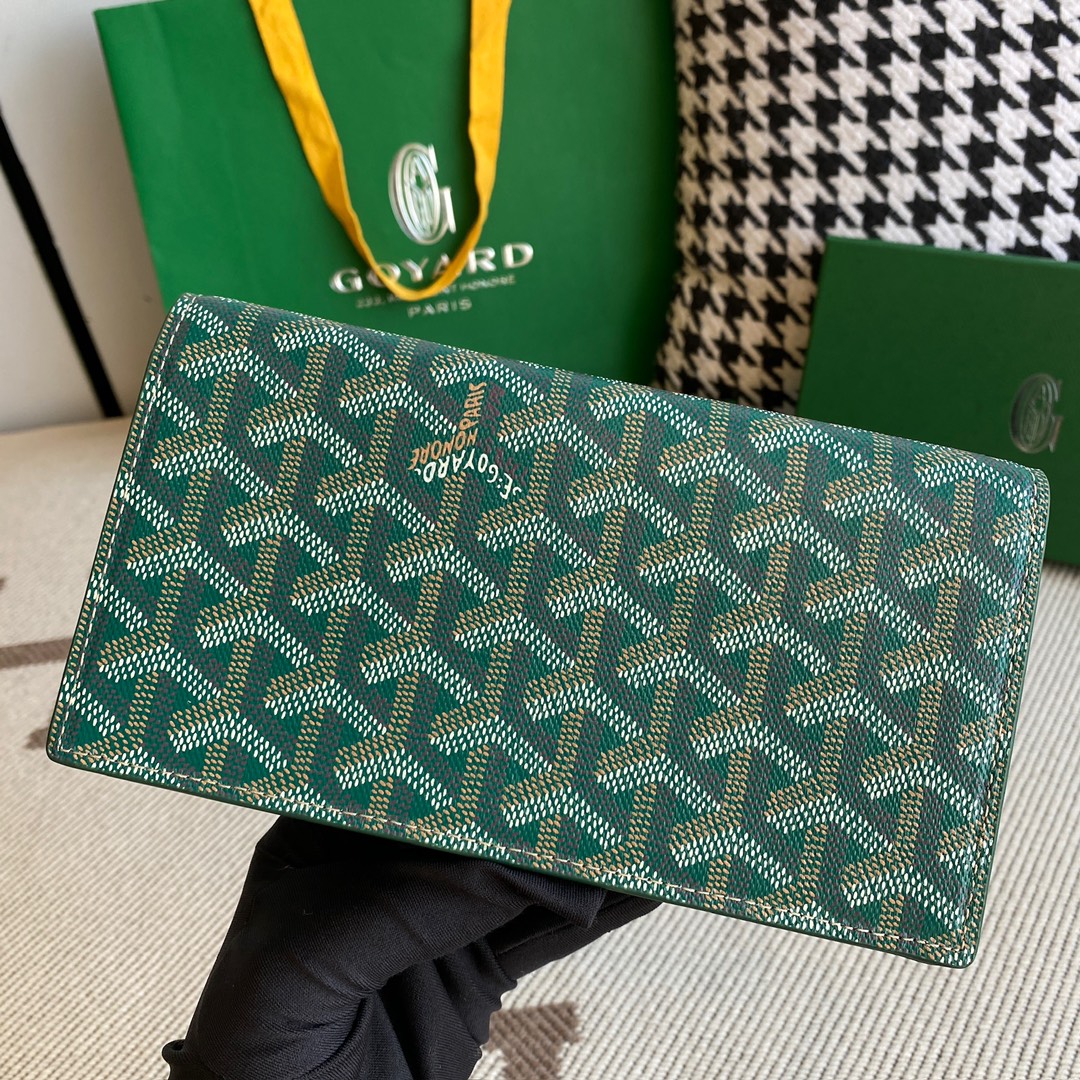 green Go*ard richelieu wallet a long wallet that fastens with a snap fastener