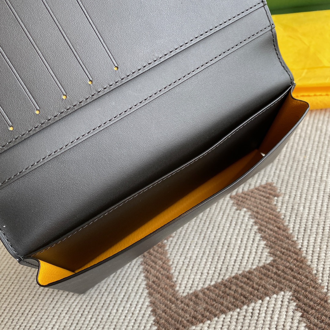 black Go*ard saint-lambert wallet is a universal phone case with all the everyday essentials in one