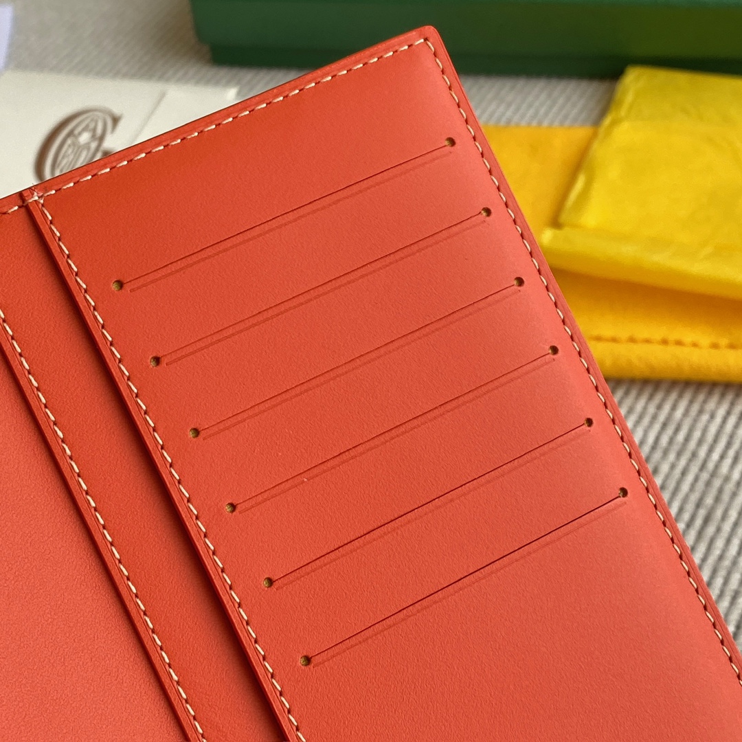 orange Go*ard saint-lambert wallet is a universal phone case with all the everyday essentials in one