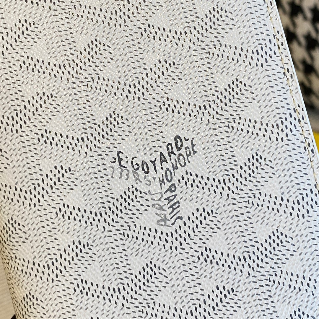 white Go*ard grenelle passport cover is ideal for travelling