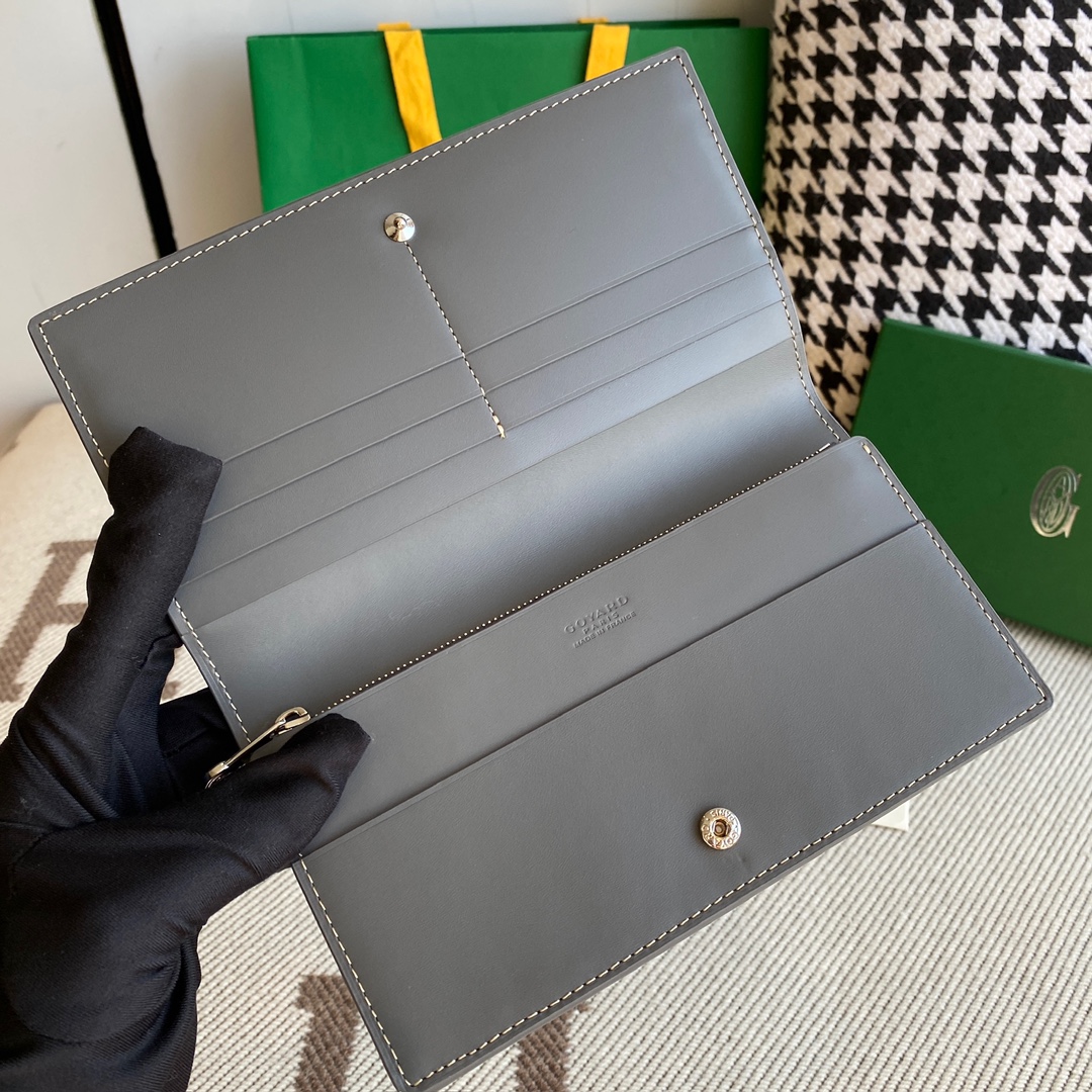 grey Go*ard richelieu wallet a long wallet that fastens with a snap fastener