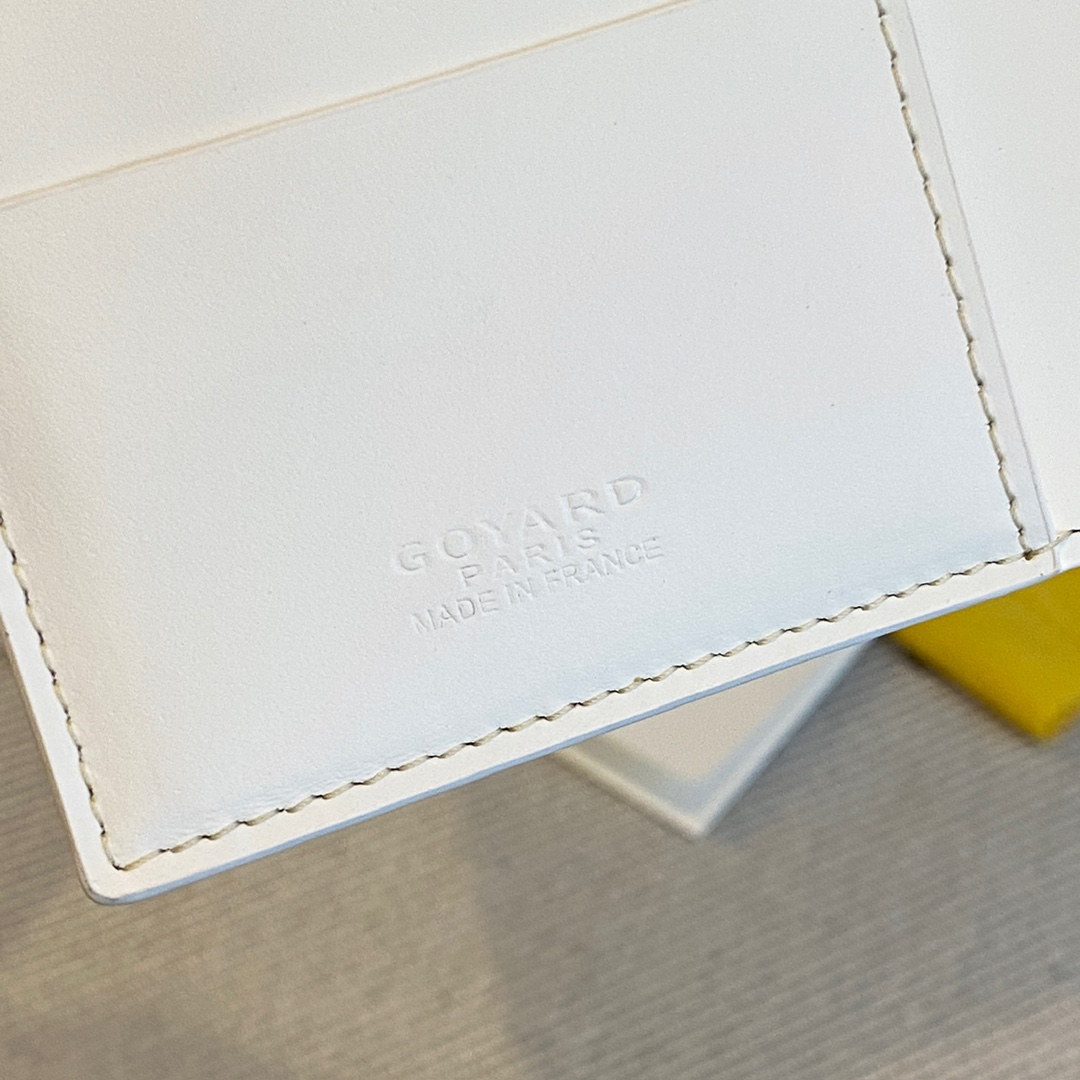 white Go*ard grenelle passport cover is ideal for travelling
