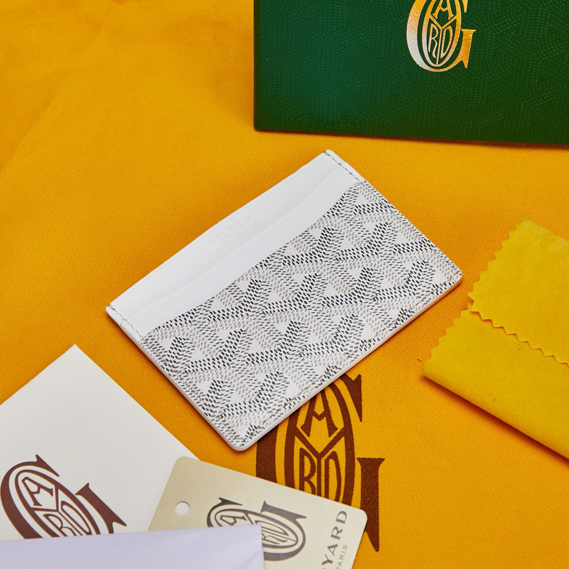 white Go*ard saint-sulpice card wallet compact for organising cards and papers or folded notes