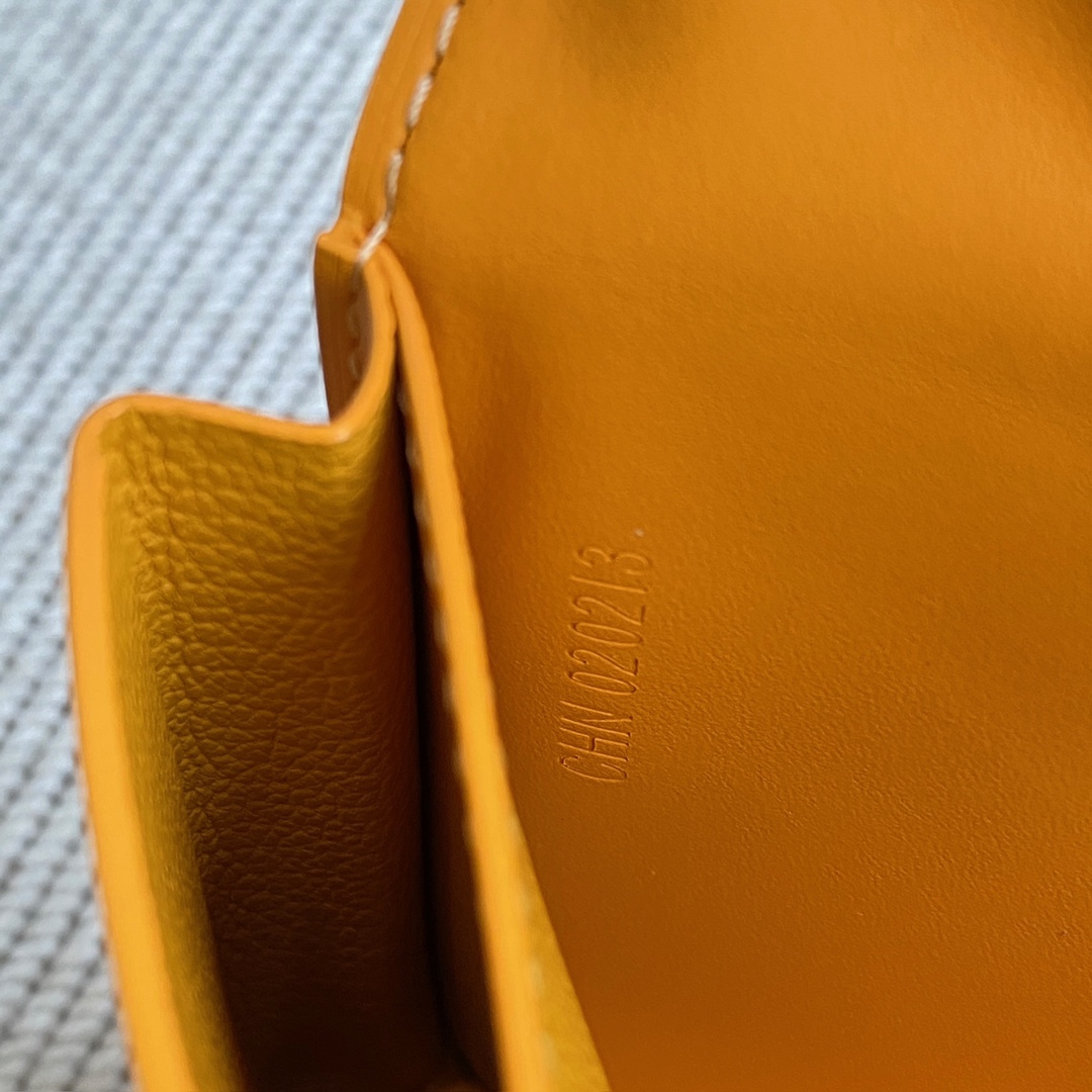 yellow Go*ard saint-lambert wallet is a universal phone case with all the everyday essentials in one