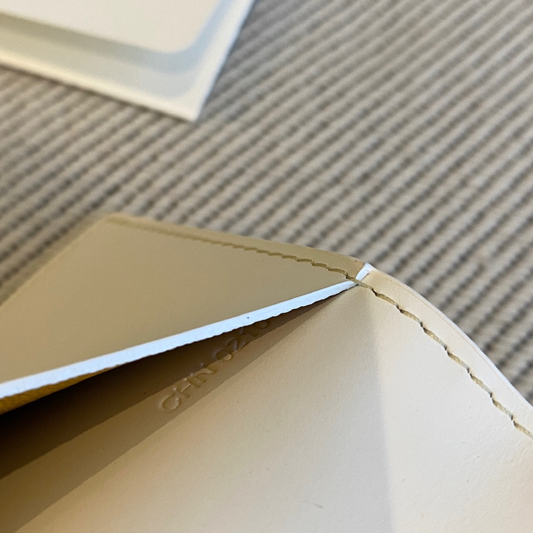 white Go*ard grenelle passport cover is ideal for travelling