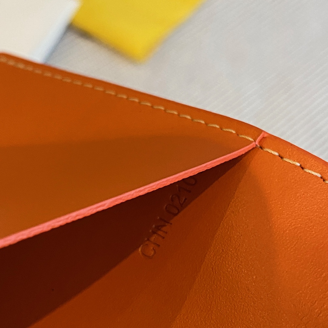 orange Go*ard grenelle passport cover is ideal for travelling