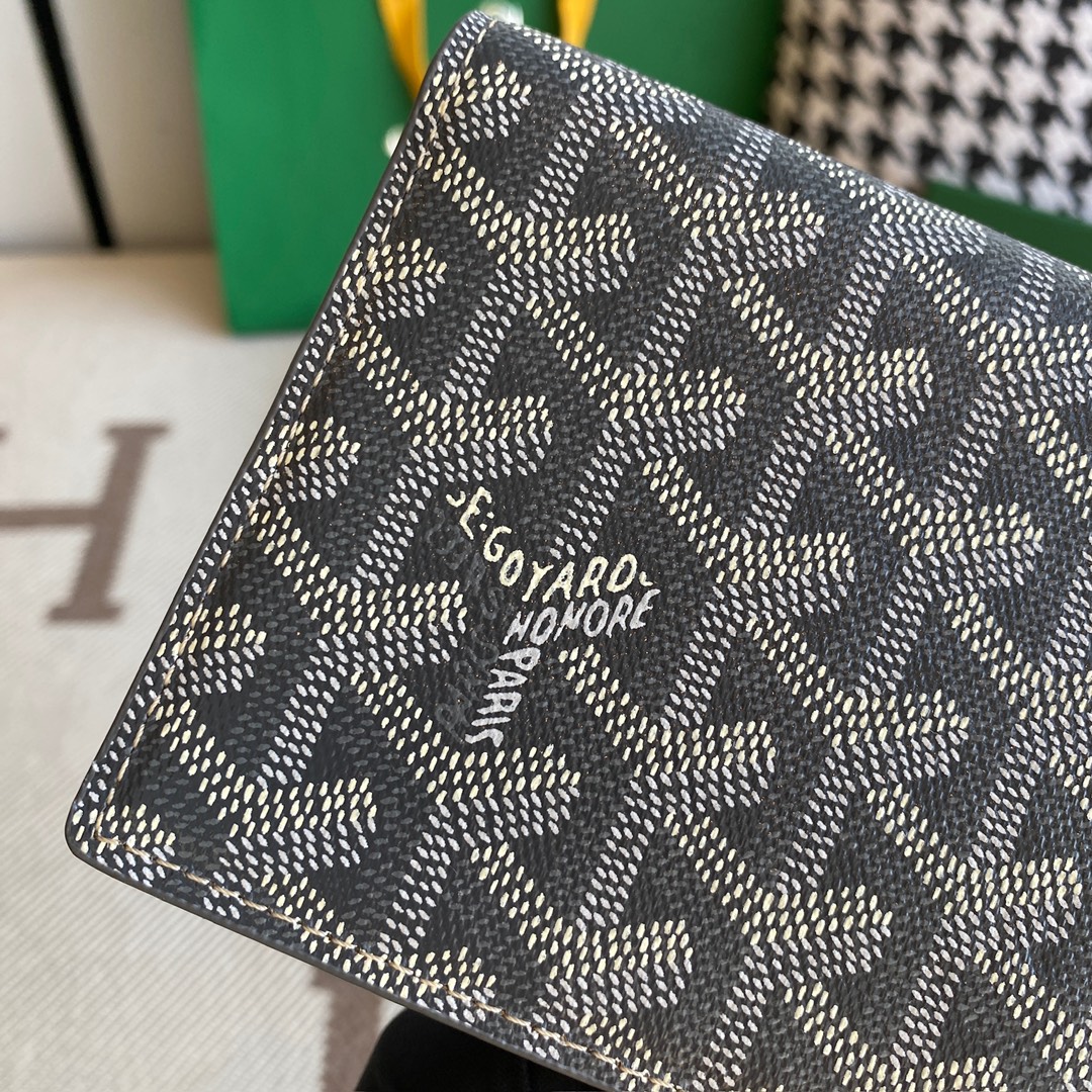 grey Go*ard richelieu wallet a long wallet that fastens with a snap fastener
