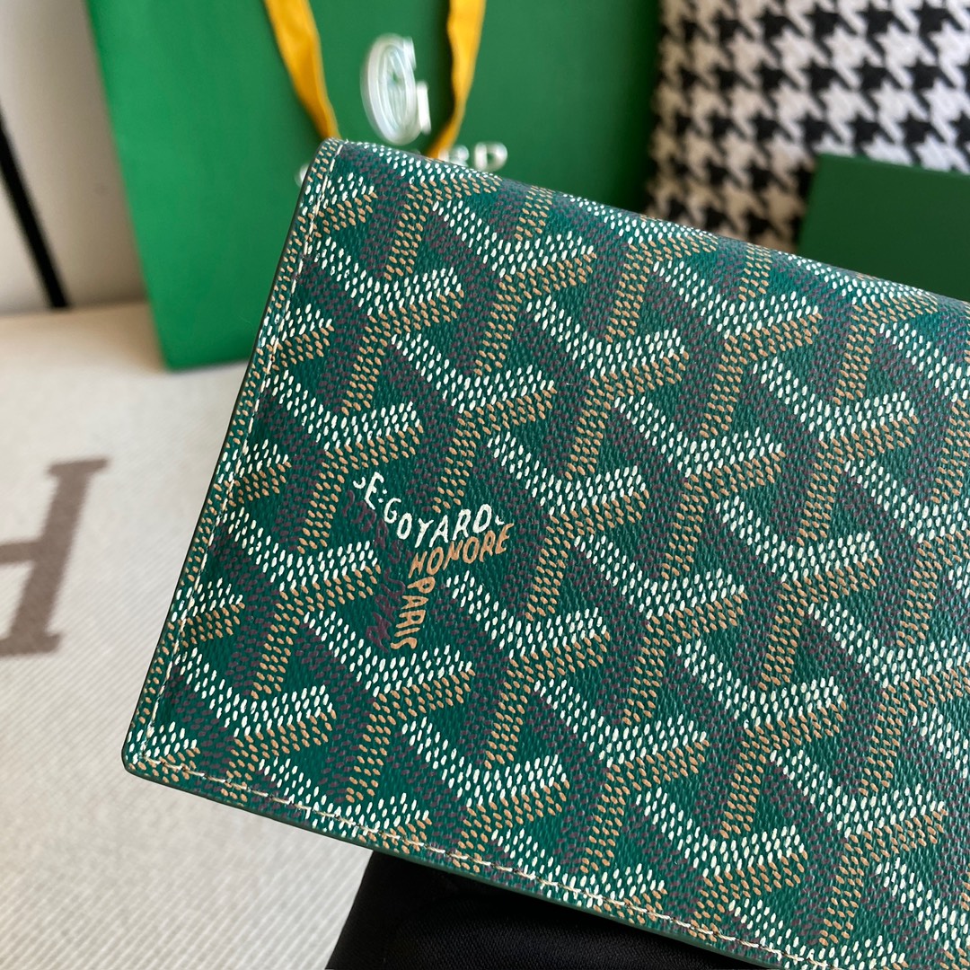 green Go*ard richelieu wallet a long wallet that fastens with a snap fastener