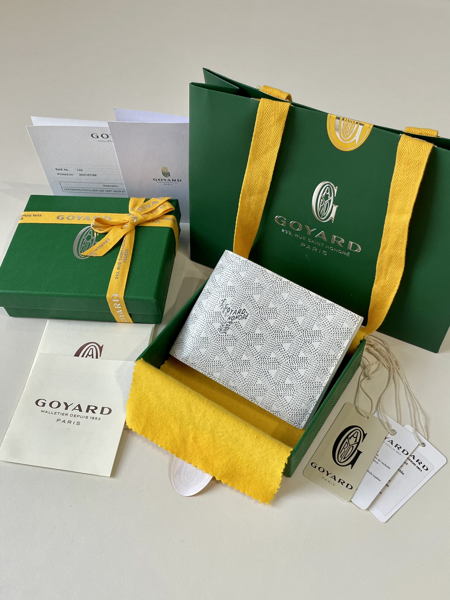 white Go*ard victoire wallet organising cards, papers and notes ,can be used in a bag