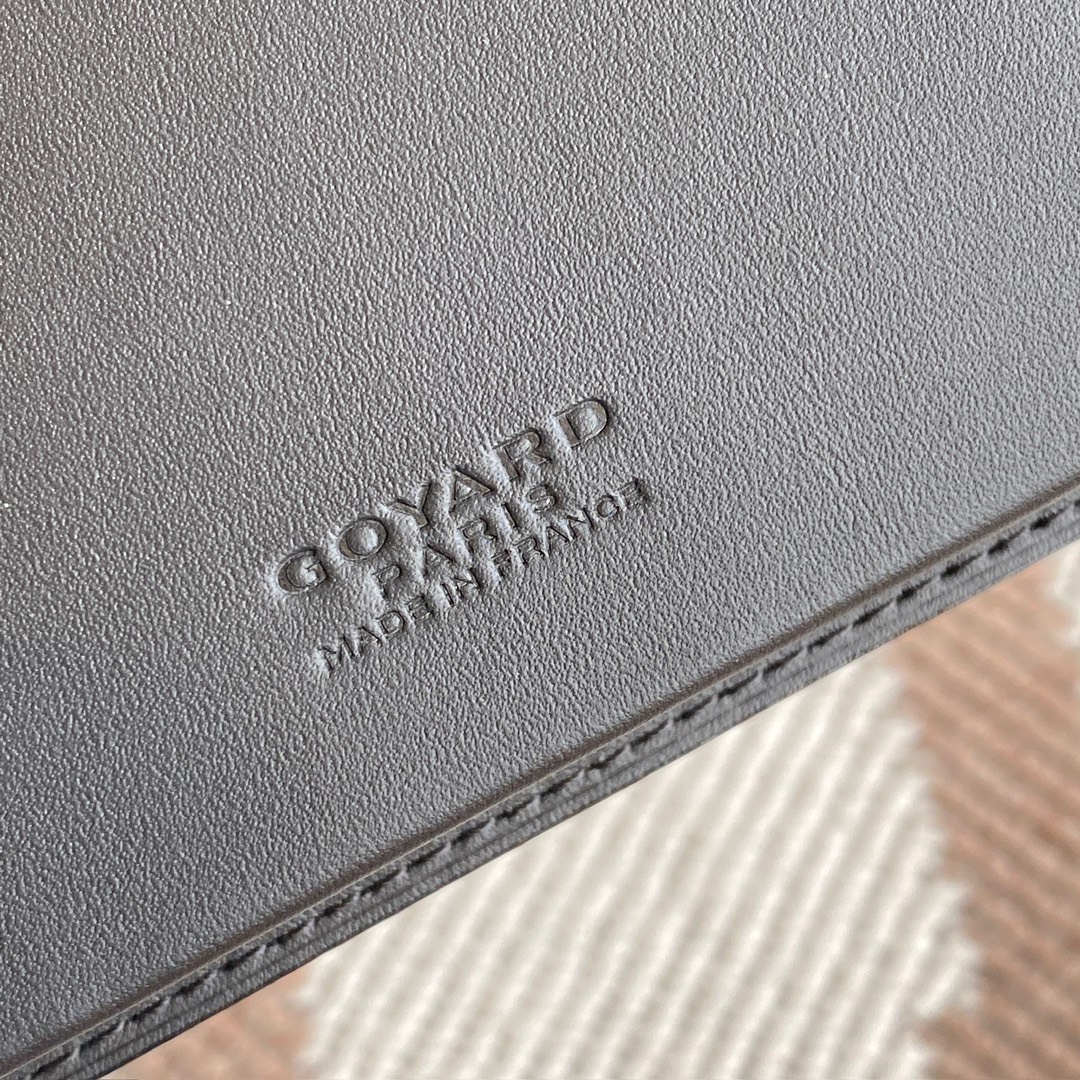 black Go*ard saint-lambert wallet is a universal phone case with all the everyday essentials in one