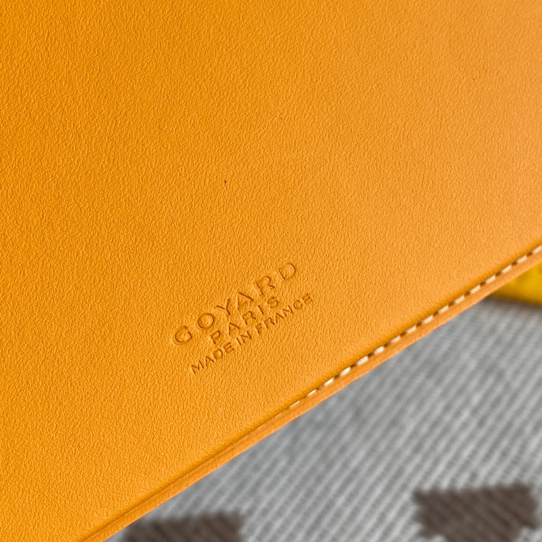 yellow Go*ard saint-lambert wallet is a universal phone case with all the everyday essentials in one