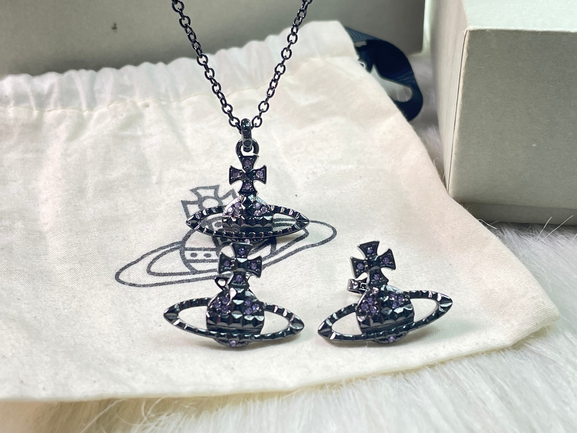 Rivet Purple Diamond Earrings